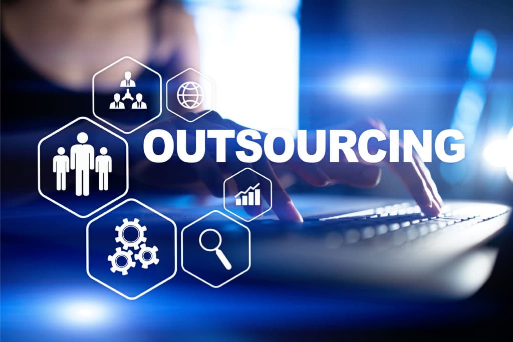 What is the difference between a temporary work agency and an outsourcing agency?